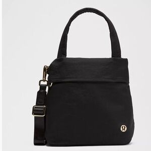Lululemon Athletica Black Shoulder Bag with Gold Accent